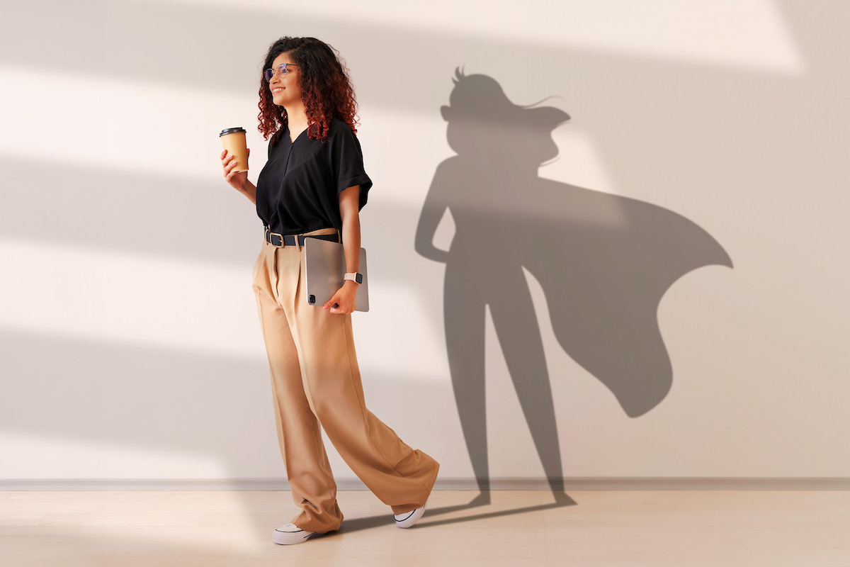 saliva and oral health, more than just spit, superhero, Image of woman with superhero shadow