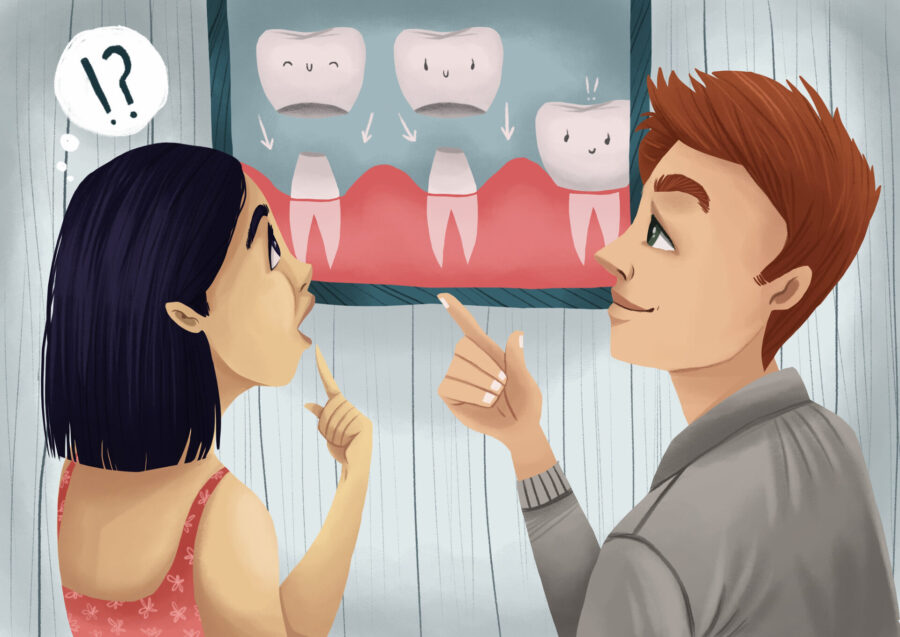 woman discussing dental crown or filling with dentist